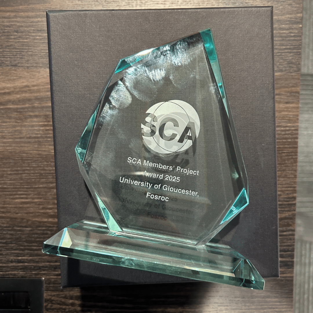 Henley Restoration and Remedials team receiving Structural Concrete Alliance Award for University of Gloucestershire refurbishment project