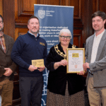 Jon Henley and Tom Cardoe receiving Wakefield Civic Society award Phoenix Mill restoration