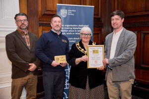 Jon Henley and Tom Cardoe receiving Wakefield Civic Society award Phoenix Mill restoration